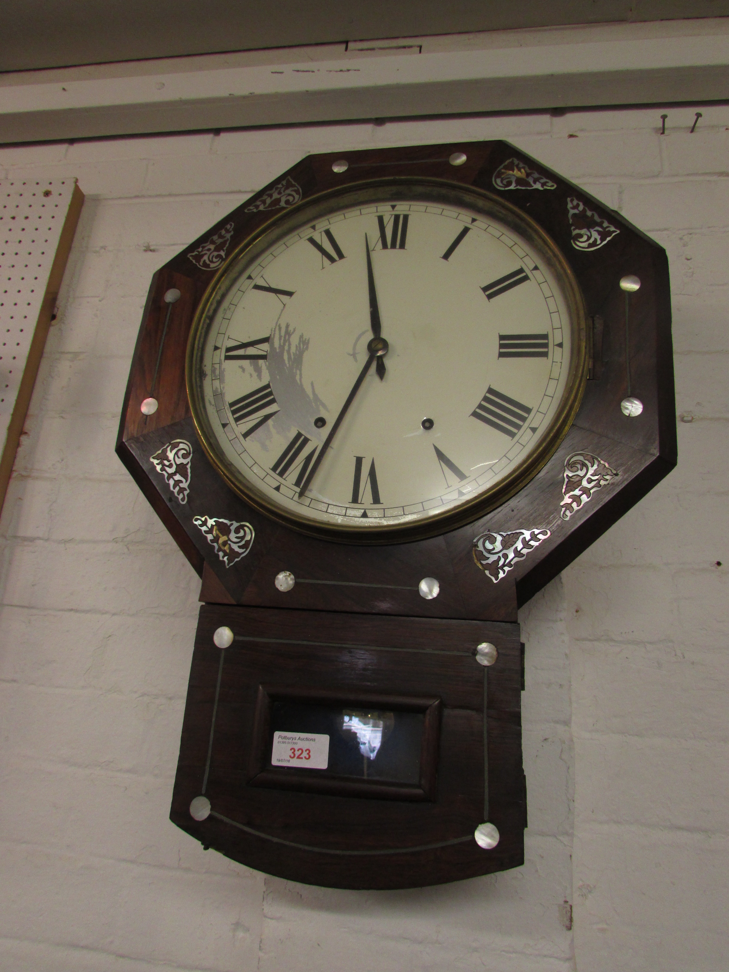 A Victorian eight-day striking wall clock. The octagonal case is of rosewood veneer and inlaid - Image 2 of 4