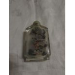 Chinese glass snuff bottle of flattened rectangular form, painted internally with birds and flowers,