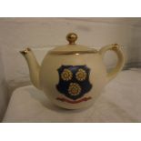MacKintyre teapot bearing coat of arms for Whitby, brown transfer factory mark, Rd No 294478