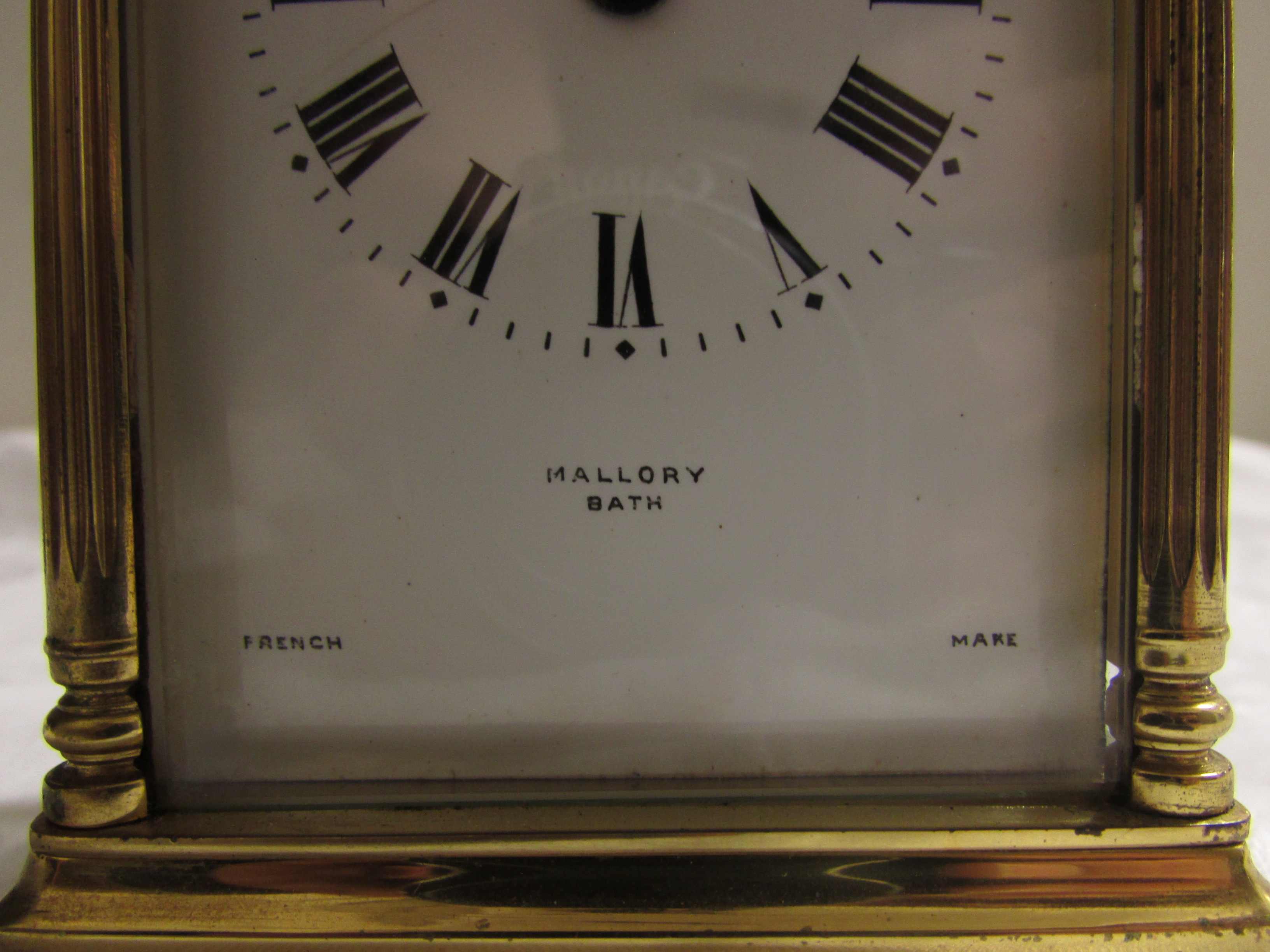 Brass carriage clock signed Mallory of Bath, French movement, (12cm x 7.5cm x 6cm) in original red - Image 3 of 6