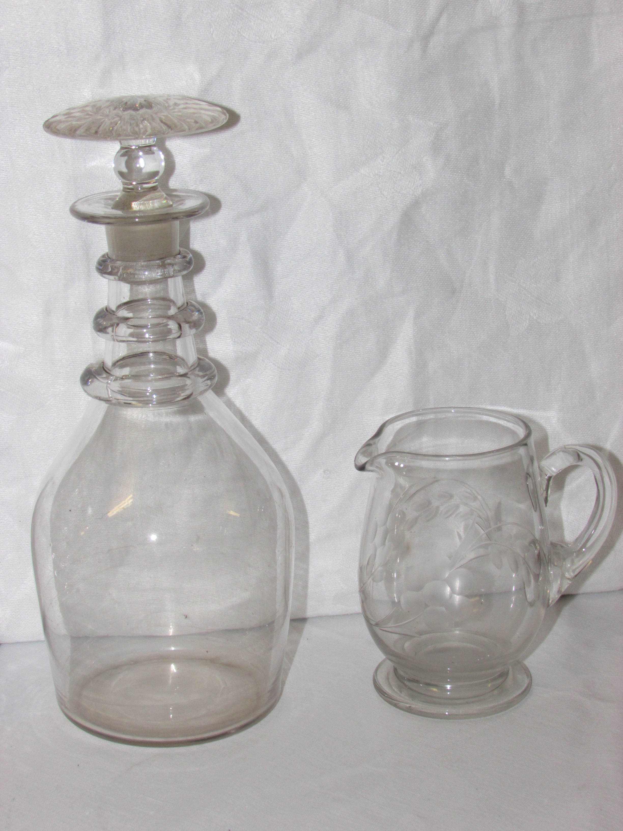 Two heavily cut glass spirit decanters and stoppers, engraved glass milk jug and wine decanter - Image 3 of 3