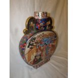 20th century Chinese porcelain moon flask, transfer decorated with figures in garden scenes,