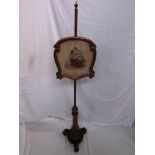 Victorian mahogany pole fire screen, the shield shaped screen (38cm x 36cm) depicting seated woman