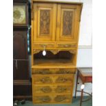 An unusual cabinet chest in satin walnut with burr walnut veneer to the drawer fronts, the top