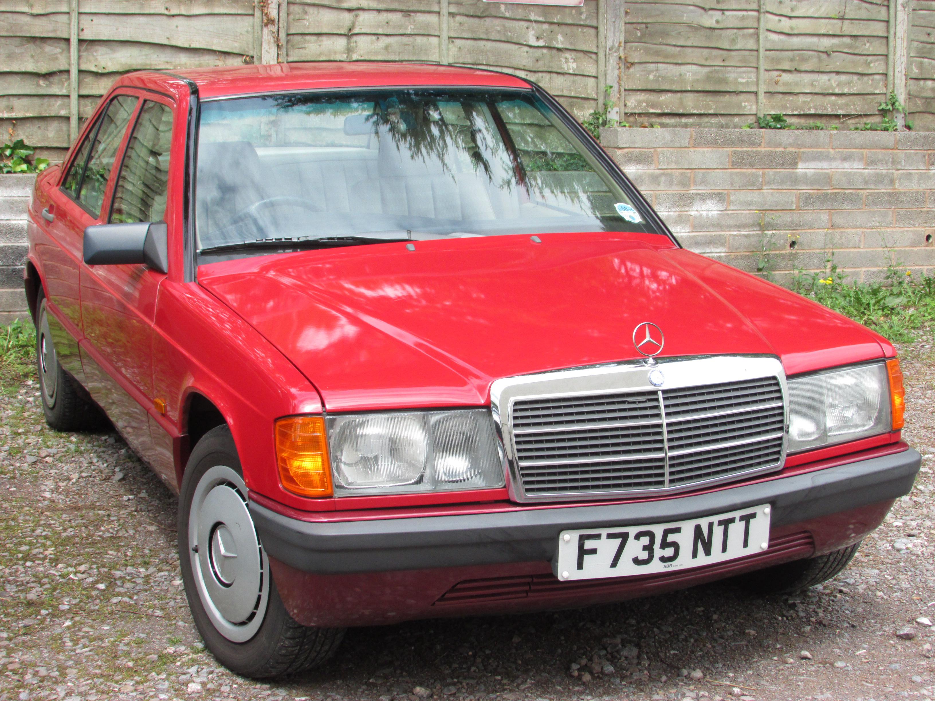 Red Mercedes 190E automatic four-door saloon, 1997 cc petrol engine, F735 NTT registered 06/09/89,