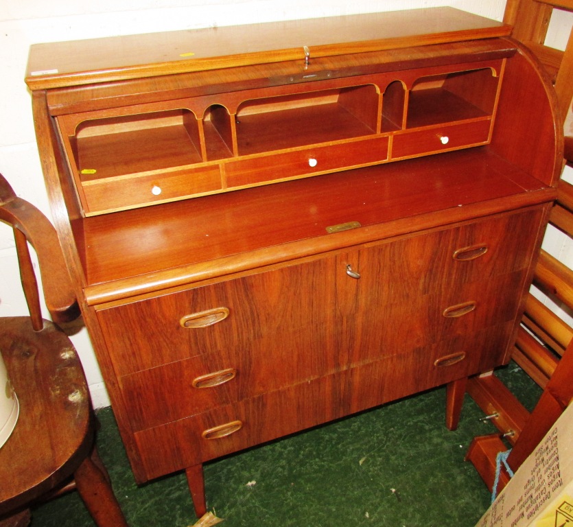 MID CENTURY TEAK AND ROSEWOOD VENEERED ROLL-TOP BUREAU WITH THREE DRAWS (TWO KEYS IN OFFICE)