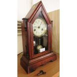 FLAMED MAHOGANY VENEERED CASED CHIMING MANTLE CLOCK WITH ENAMELLED DIAL, WITH PENDULUM AND WINDING