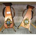 PAIR OF ARTS AND CRAFTS HAND BEATEN COPPER TWO HANDLED VESSELS WITH BRASS LEGS AND DECORATION (A/F)