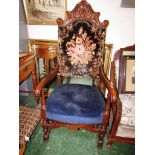 LARGE ORNATELY CARVED ARMCHAIR WITH BLUE UPHOLSTERED SEAT AND TAPESTRY UPHOLSTERED BACK