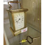 FRENCH MADE COMPANY OF MASTER JEWELLERS BRASS CASED CARRIAGE CLOCK WITH WINDING KEY