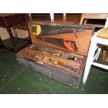 WOODEN CARPENTER'S CHEST WITH CONTENTS OF HAND TOOLS INCLUDING SAWS, FILES, ETC