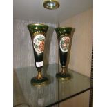 PAIR OF GREEN AND GILT GLASS CHALICES WITH FLORAL PORCELAIN BADGES