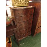 MAHOGANY VENEERED SERPENTINE NARROW CHEST OF SIX DRAWERS