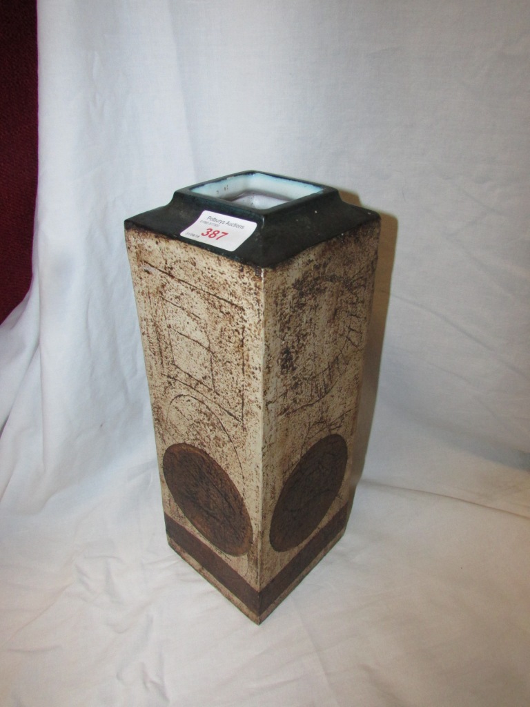 TALL TROIKA POTTERY VASE OF SQUARE SECTION, GLAZED IN BROWNS WITH DARK BROWN CIRCLES AND DARK