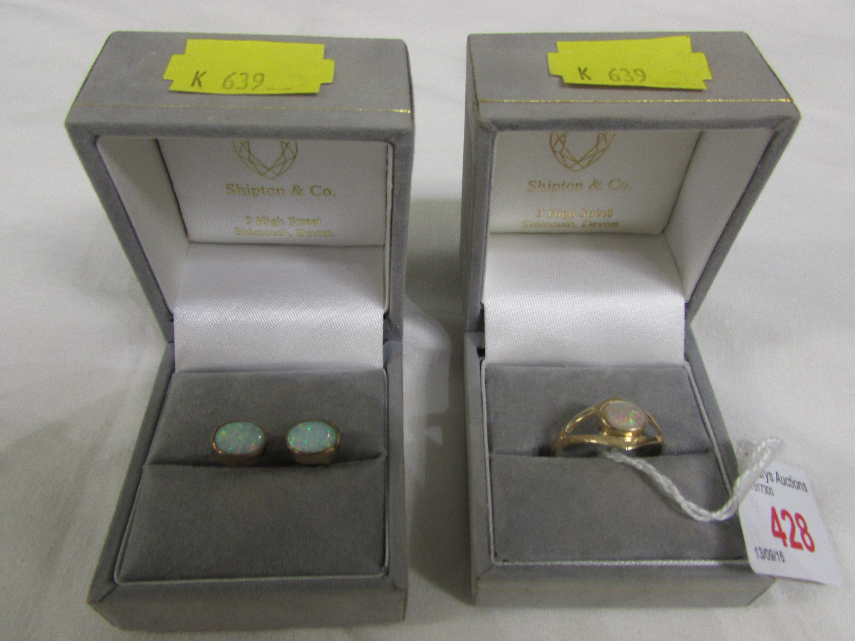 9-CARAT GOLD RING SET WITH OPAL (7MM x 5MM APPROXIMATELY) AND MATCHING YELLOW METAL EARRINGS, EACH