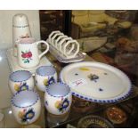 NINE PIECES OF POOLE POTTERY TABLE WARE