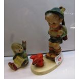 HUMMEL FIGURE OF BOY AND RABBIT AND HUMMEL CANDLESTICK FIGURE OF GIRL WITH ACCORDION