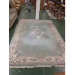 LARGE RECTANGULAR EMBOSSED CHINESE FLOOR RUG WITH PALE FOLIATE PATTERN