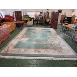 SUBSTANTIAL CREAM AND GREEN GROUND EMBOSSED CHINESE STYLE RECTANGULAR FLOOR RUG