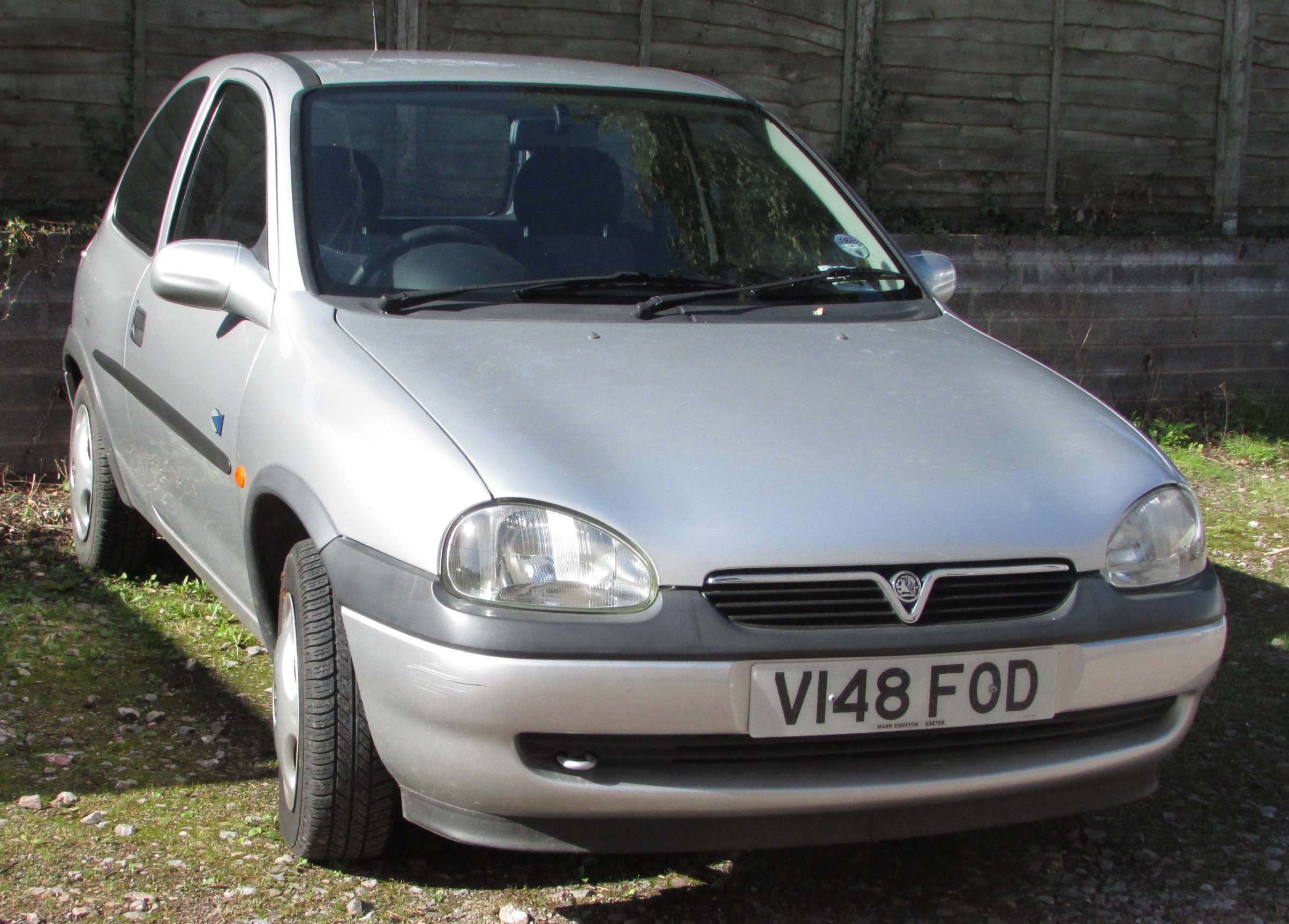 Silver Vauxhall Corsa Club 12V three door hatchback, registration number V148 FOD, date of first