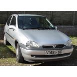 Silver Vauxhall Corsa Club 12V three door hatchback, registration number V148 FOD, date of first