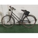 Vintage Raleigh three-speed bicycle with Brooks saddle and rear leather bag