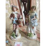 TWO CONTINENTAL CERAMIC FIGURES OF MAN AND WOMAN (A/F)