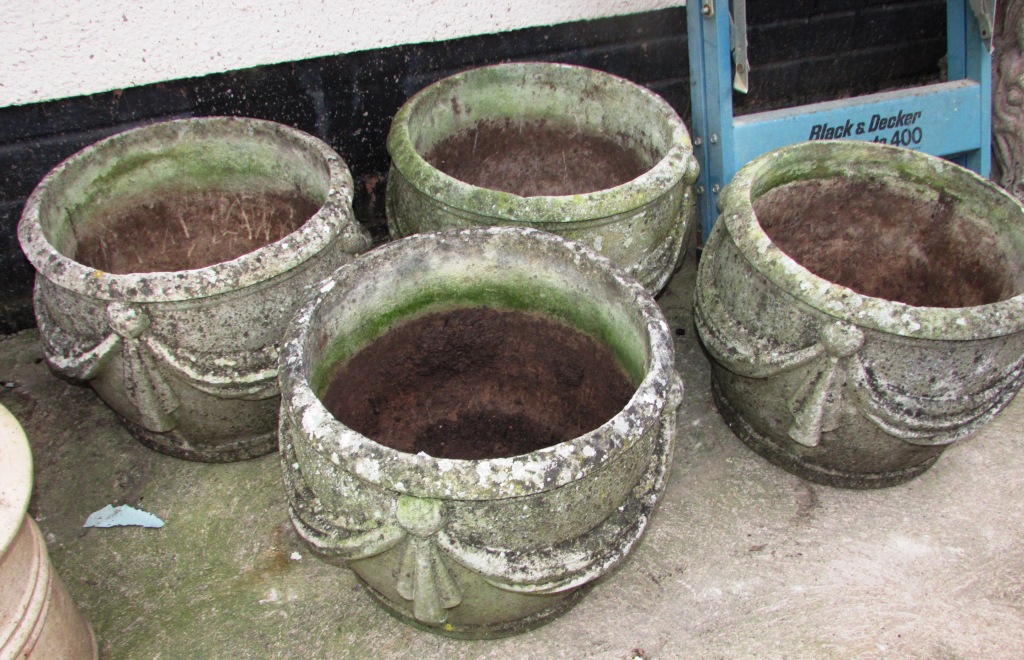 FOUR CIRCULAR STONEWARE GARDEN POTS