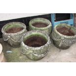 FOUR CIRCULAR STONEWARE GARDEN POTS