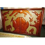 FRAMED AND MOUNTED WOODEN CARVING OF ANIMALS WITH ACCOMPANYING NEWSPAPER CUTTING AND TELEGRAM (IN