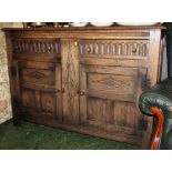 OAK SIDEBOARD WITH TWO DRAWERS OVER TWO CUPBOARD DOORS