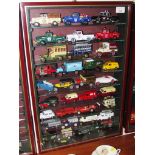 SELECTION OF LLEDO, VANGUARDS AND MATCHBOX DIE-CAST VEHICLES INCLUDING AA PATROL VAN IN WALL MOUNTED