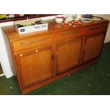 G-PLAN TEAK VENEERED SIDEBOARD WITH THREE DRAWERS OVER THREE CUPBOARD DOORS