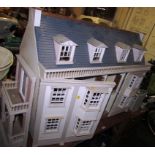 LARGE PAINTED WOODEN DOLL'S HOUSE WITH BOX OF ACCESSORIES