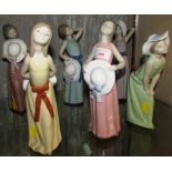 SET OF SIX LLADRO FIGURINES OF GIRLS WITH HATS - YELLOW, PINK, BROWN, BLUE, GREEN AND MAUVE (