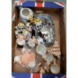 A collection of pig related items to include polished metal tray, metal pin cushions,