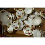 A collection of Royal Albert Old Country Rose tea ware to include 2 tea pots, cups, saucers,