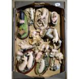 A collection of Border Fine Arts resin pigs,