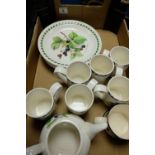 A collection of Portmeirion items including mug dinner plates etc.