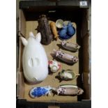 A collection of ceramic pigs ornaments (