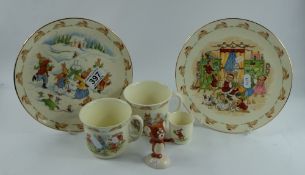 A collection of Royal Doulton Bunnykins series ware to include Snowman plate PN198,