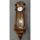 Oak long cased wall clock