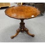 Occasional table with pie crust trim and highly decorated 3 footed pedestal