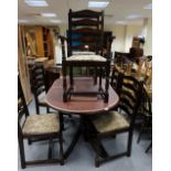 Reproduction oak dining table and matching 6 ladderback chairs