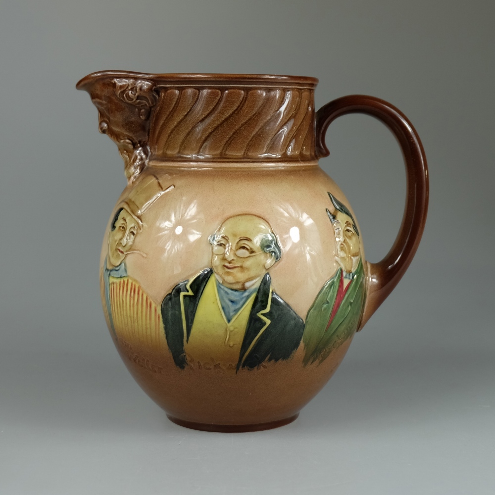 Royal Doulton embossed Dickens seriesware jug with mask head spout decorated with various busts