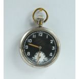 Military pocket watch with black dial marked to the back with broad arrow G.S.T.