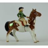 Beswick girl on skewbald pony 1499