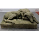 Old composition stone model of a lying lurcher dog,