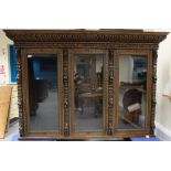 Victorian good quality carved oak four door bookcase on stand,