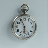 Military pocket watch with white dial marked to the back with broad arrow G.S.T.